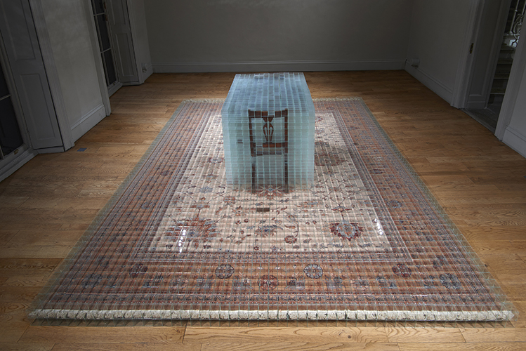 image: David Cheeseman 'Once ever After: Thrice Removed' 383×290×81(h)cm, 2014, glass, tape, carpet and furniture (7,752 glass boxes, each 58mm cubed) installation photography by Andy Keate