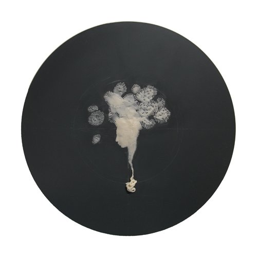 Felicity Powell 'Cactus Gut' (wax on back of mirror, 20 cm/7.9" diameter, 2008)