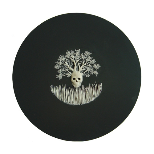 Felicity Powell 'Skull' (wax on back of mirror, 20cm/7.9" diameter, 2009)