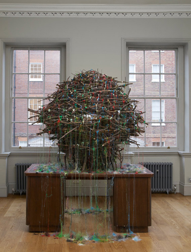 Mhairi Vari 'Hub (John Street)' (Gazing Ball, hot–melt glue, desk, twigs 250(h)×180×180cm 2011) photo by Andy Keate